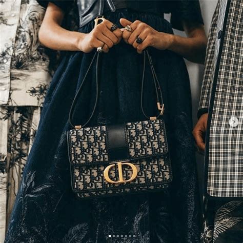 vintage dior clutch street style|Dior montaigne clutch.